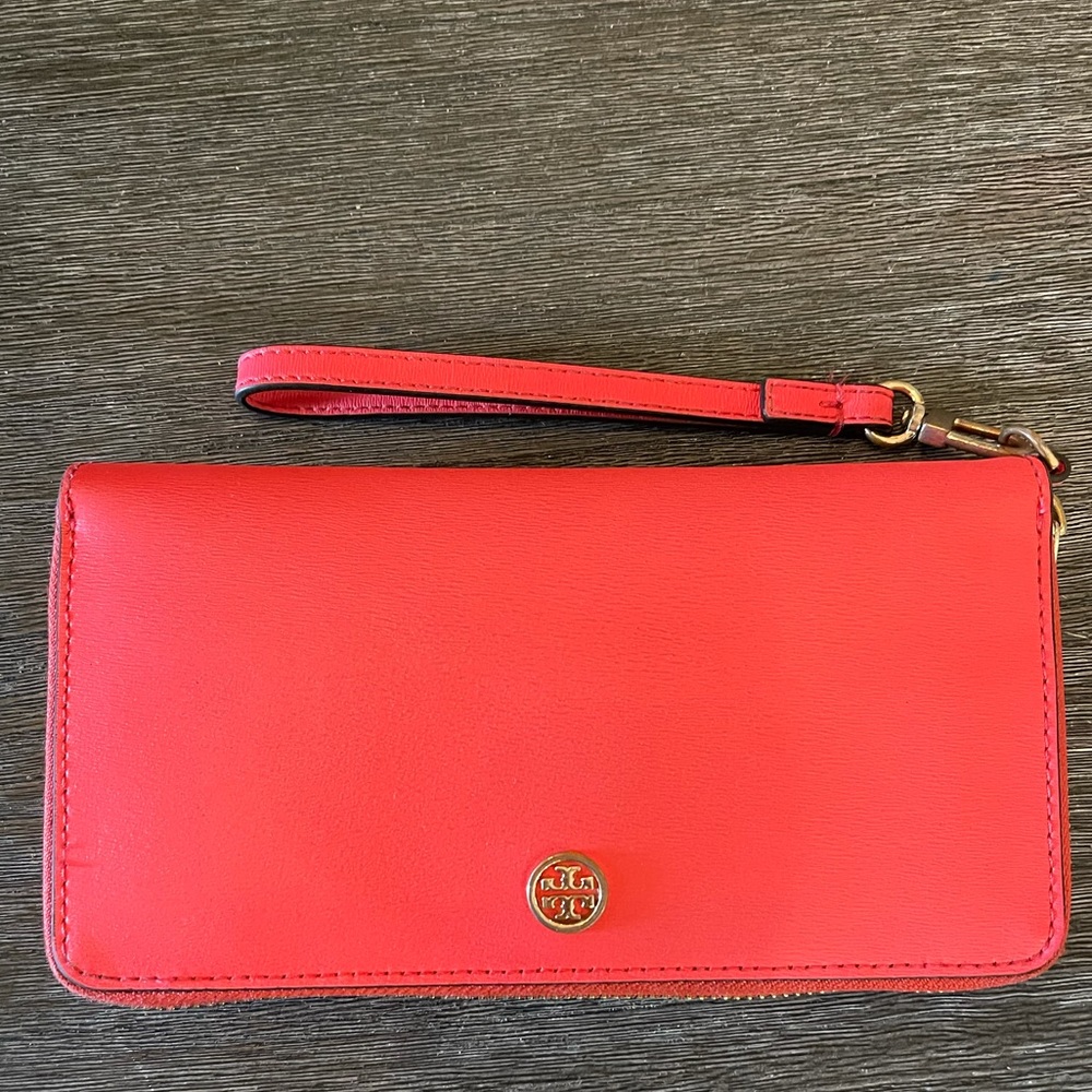 Coral pink Tory Burch Zip around wrist wallet